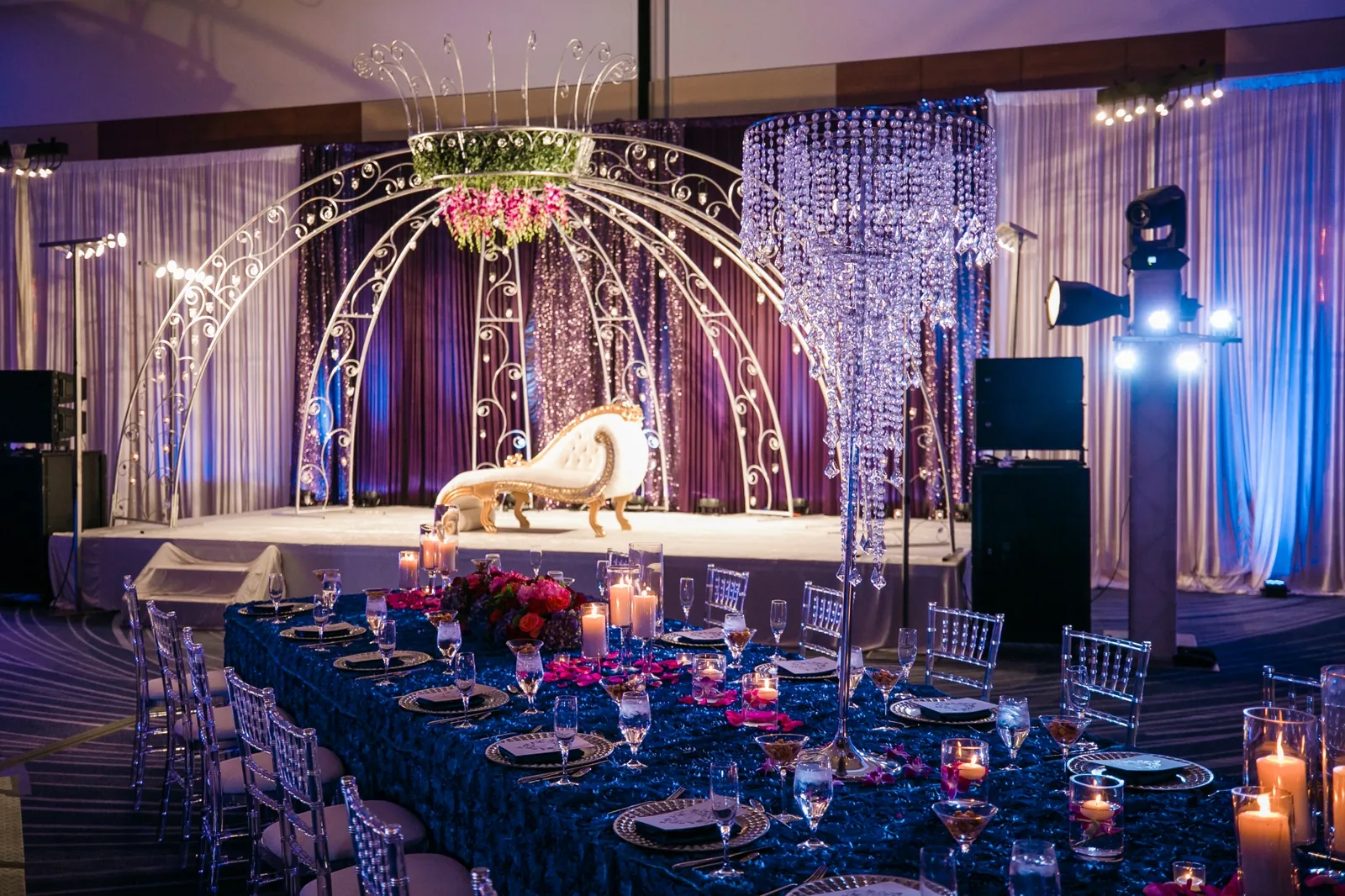 Decorated carriage centerpiece for an Indian wedding reception