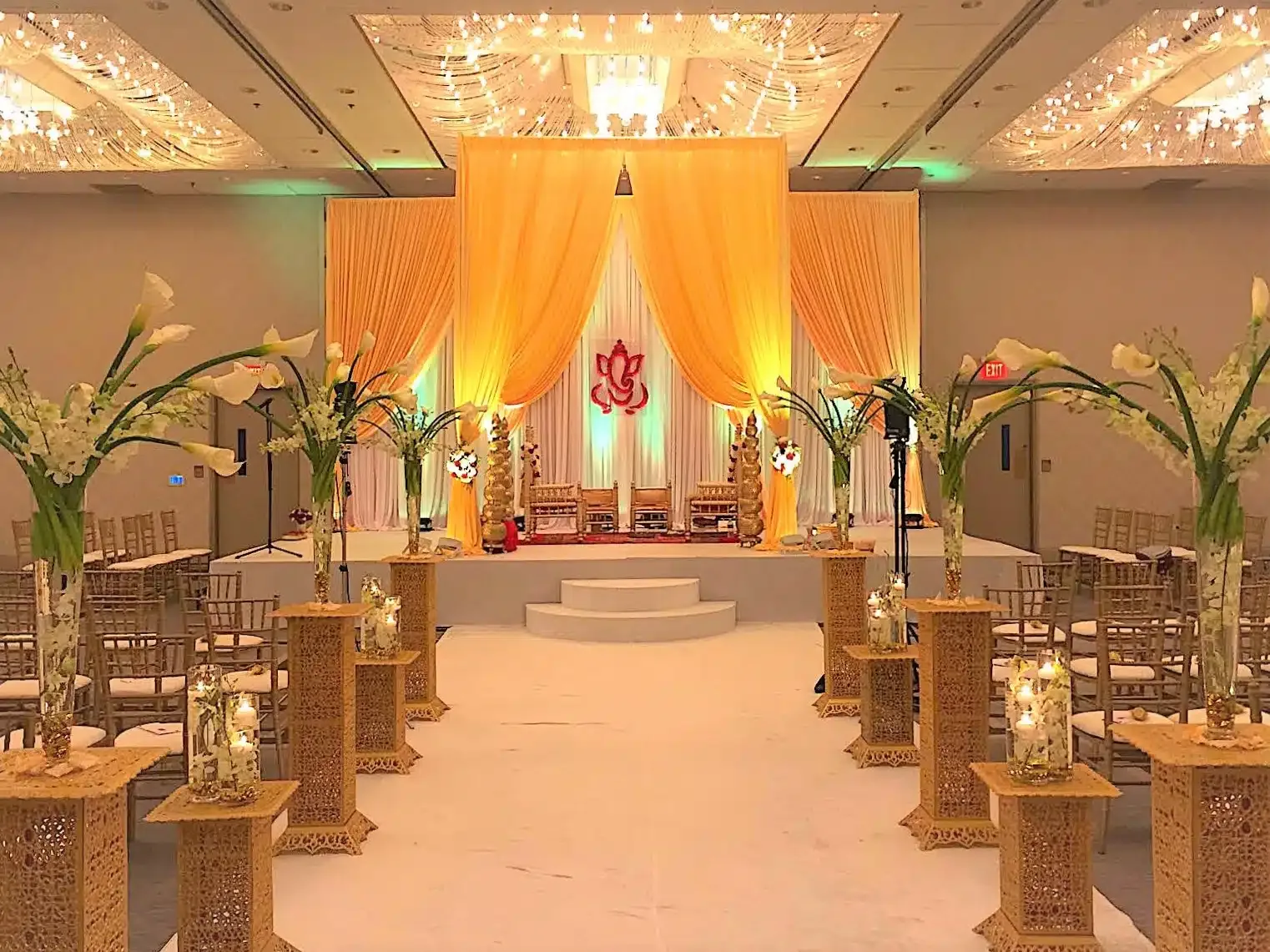 Ivory fabric mandap for an Indian wedding ceremony
